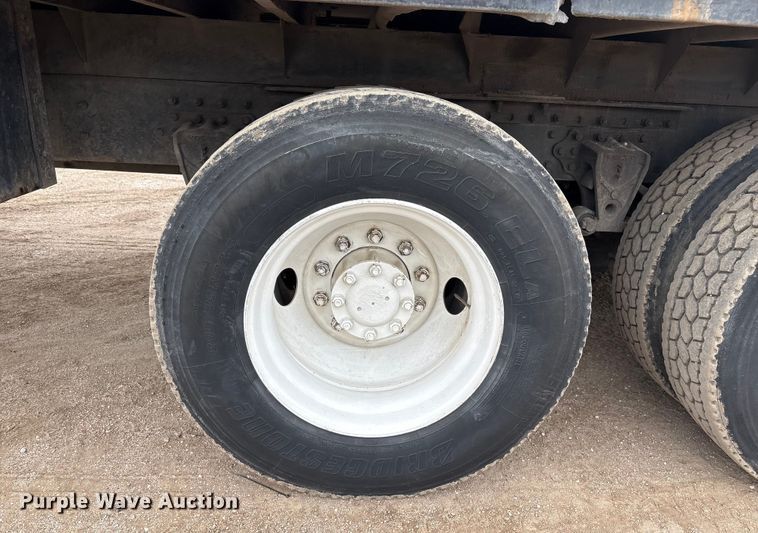 image for item FG2640 1997 Volvo WG-64T flatbed truck