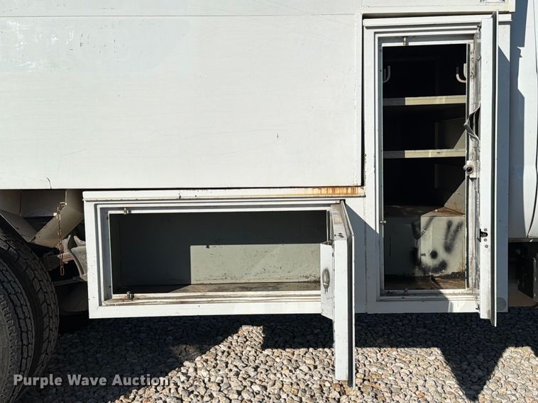 image for item YA1478 2011 Ford F750 Super Duty chipper truck