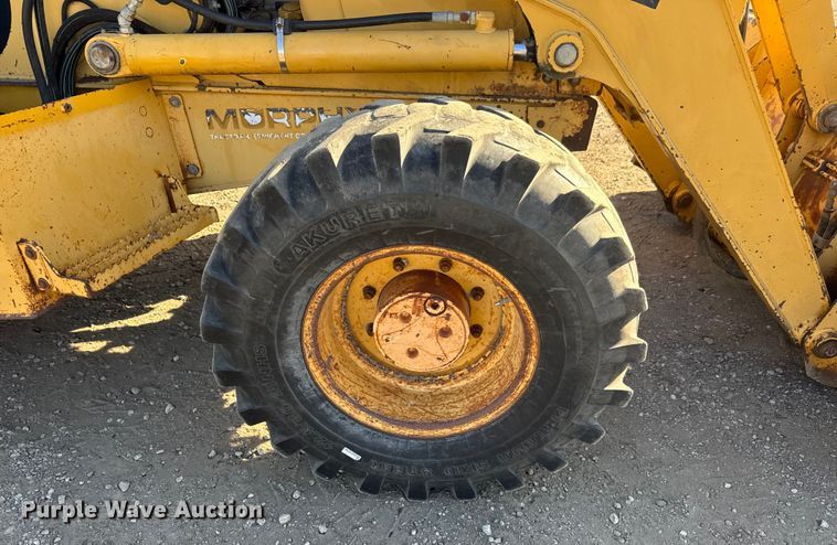 image for item ET4088 1998 John Deere 310SE backhoe