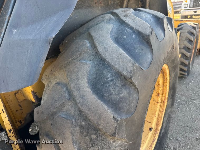 image for item ET4088 1998 John Deere 310SE backhoe