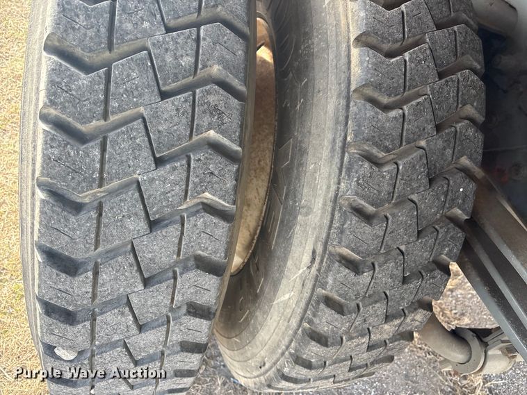 image for item EV2656 1990 GMC C7 digger derrick truck