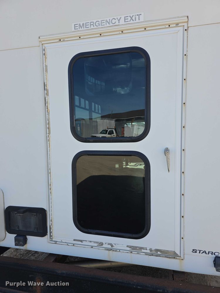 image for item FI0601 2008 Ford E450 Super Duty shuttle bus