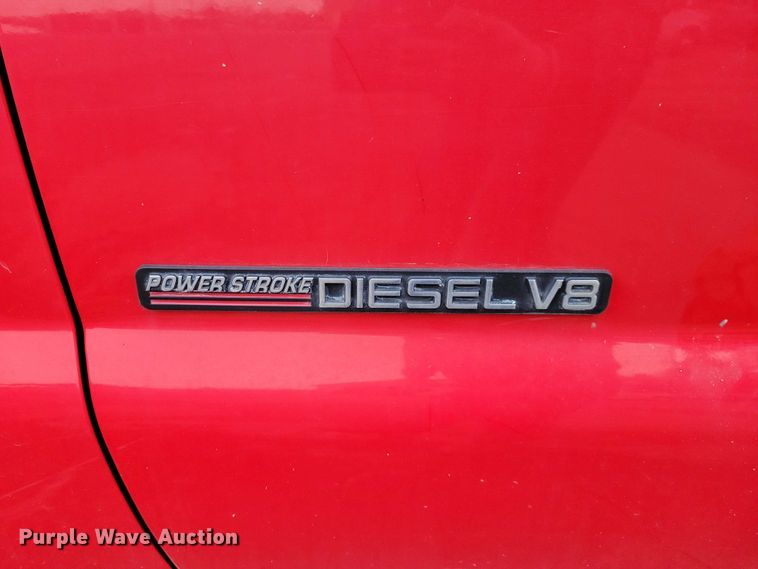 image for item NO9998 2000 Ford F450 Super Duty XL Crew Cab flatbed truck