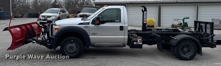 image for item OE9529 2016 Ford F550 Super Duty hook lift truck