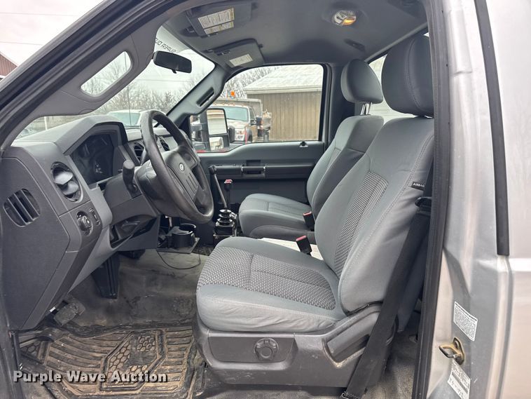 image for item OE9529 2016 Ford F550 Super Duty hook lift truck