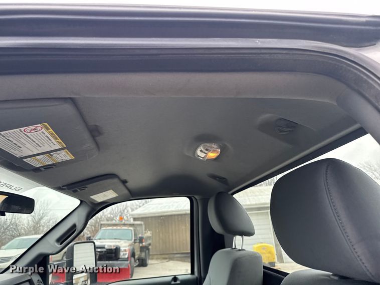 image for item OE9529 2016 Ford F550 Super Duty hook lift truck