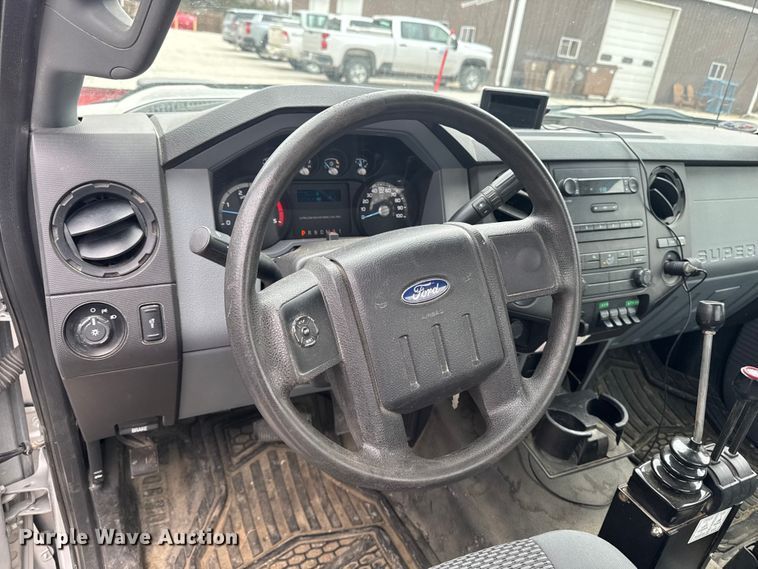 image for item OE9529 2016 Ford F550 Super Duty hook lift truck