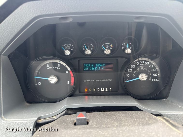 image for item OE9529 2016 Ford F550 Super Duty hook lift truck