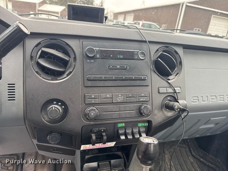 image for item OE9529 2016 Ford F550 Super Duty hook lift truck