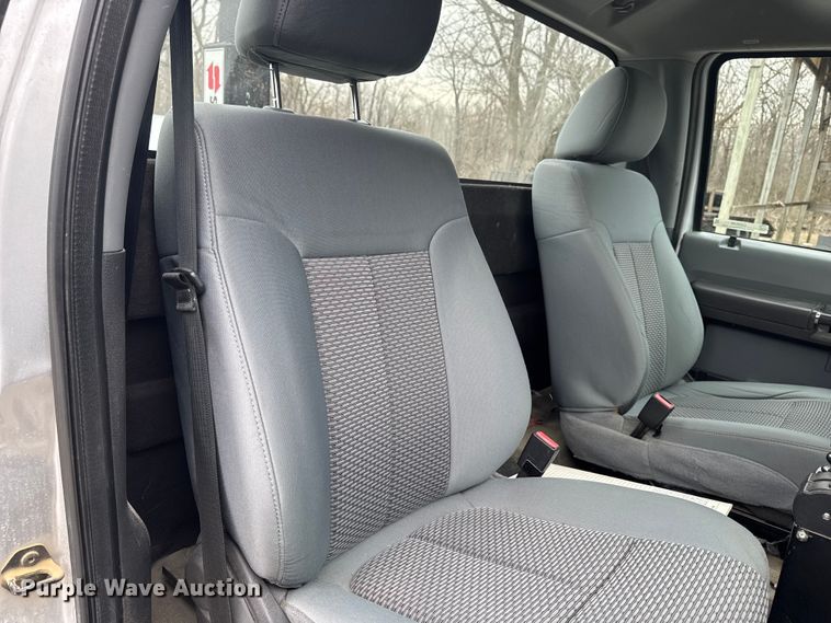 image for item OE9529 2016 Ford F550 Super Duty hook lift truck