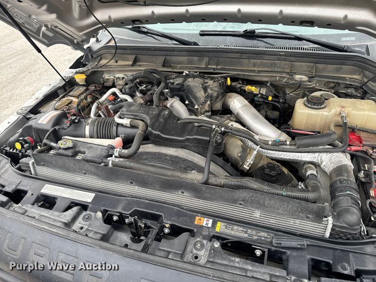 image for item OE9529 2016 Ford F550 Super Duty hook lift truck