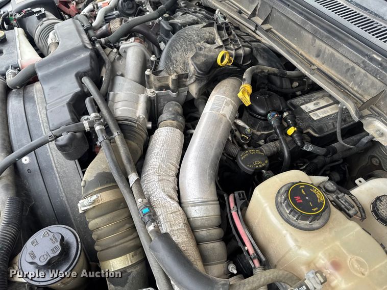 image for item OE9529 2016 Ford F550 Super Duty hook lift truck