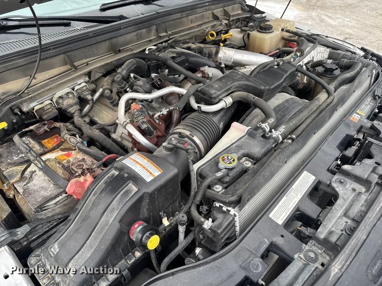 image for item OE9529 2016 Ford F550 Super Duty hook lift truck