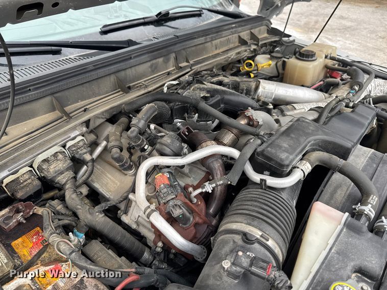 image for item OE9529 2016 Ford F550 Super Duty hook lift truck