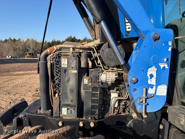 image for item ES5761 2006 New Holland TS110A MFWD tractor