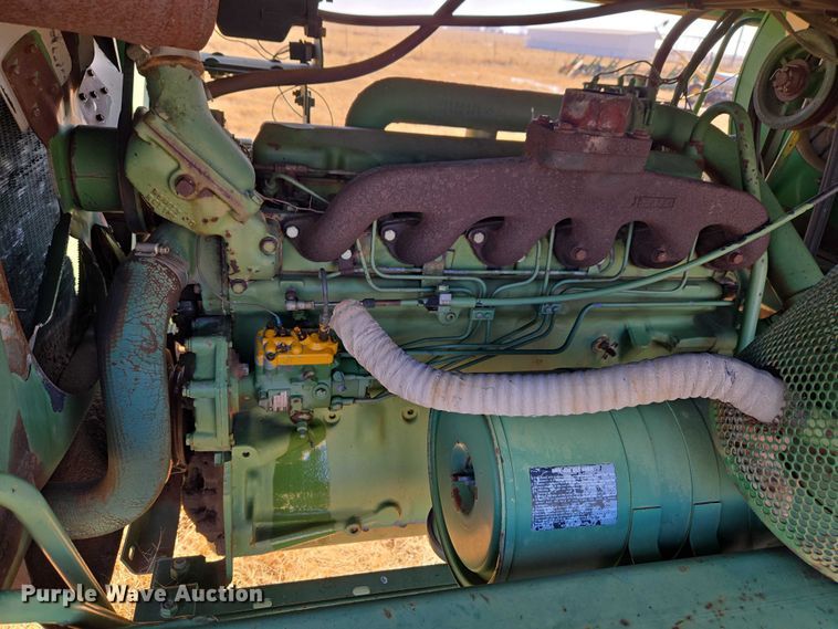 image for item ET1233 John Deere 484 cotton stripper