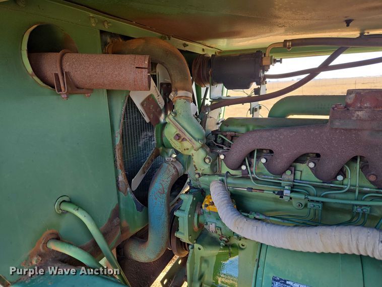 image for item ET1233 John Deere 484 cotton stripper