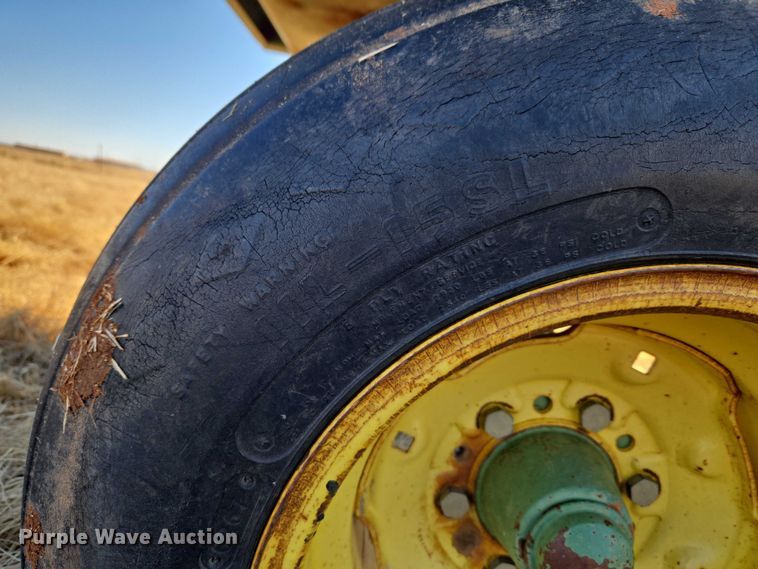 image for item ET1233 John Deere 484 cotton stripper