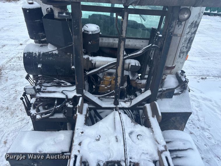 image for item DK0202 2002 Peterbilt 320 roll-off container truck