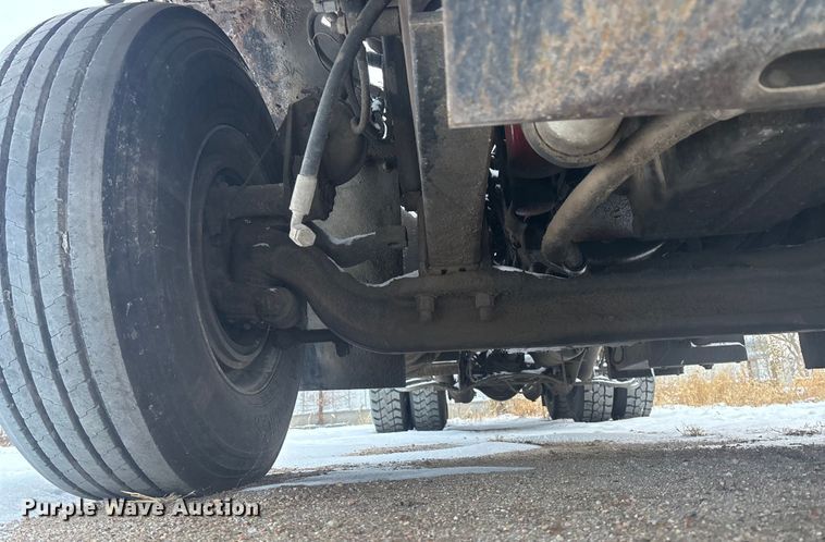 image for item DK0202 2002 Peterbilt 320 roll-off container truck