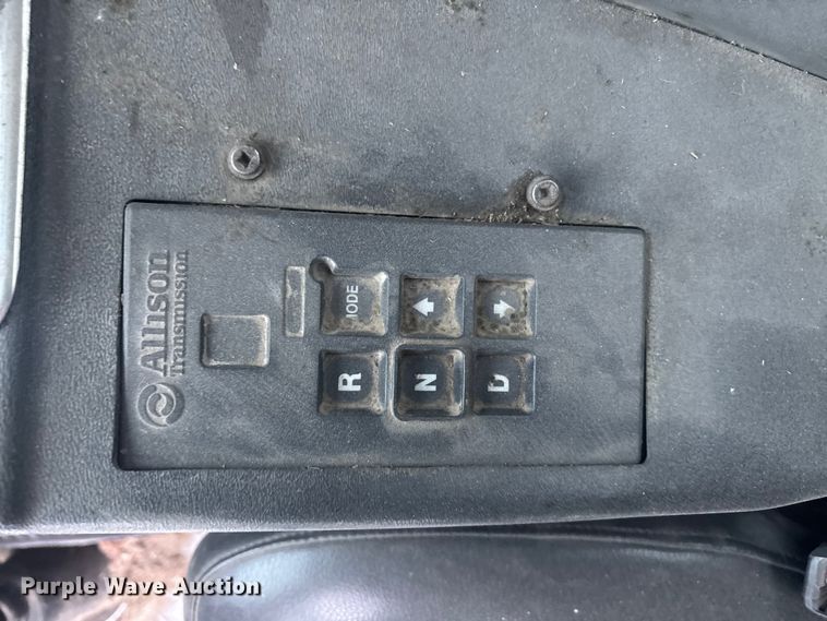 image for item DK0202 2002 Peterbilt 320 roll-off container truck