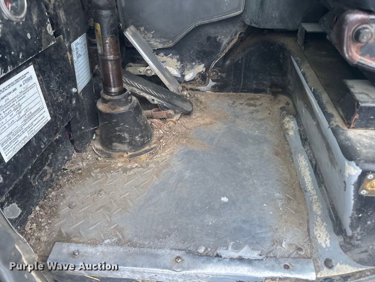 image for item DK0202 2002 Peterbilt 320 roll-off container truck