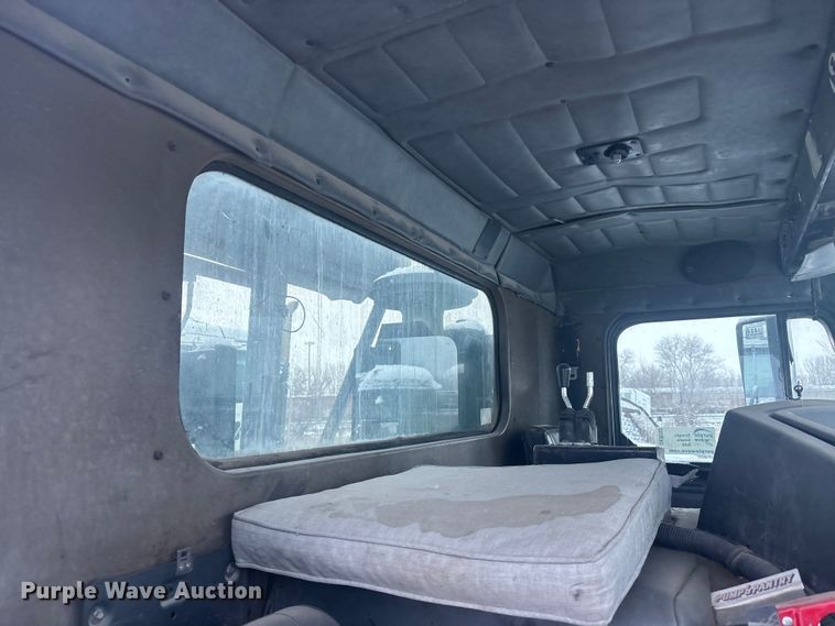 image for item DK0202 2002 Peterbilt 320 roll-off container truck