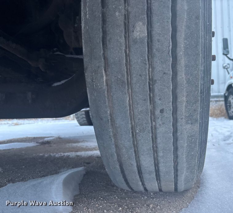 image for item DK0202 2002 Peterbilt 320 roll-off container truck