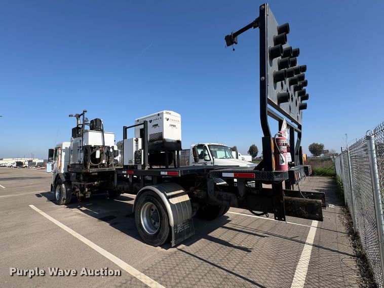 image for item EC8214 2013 Peterbilt 320 flatbed truck