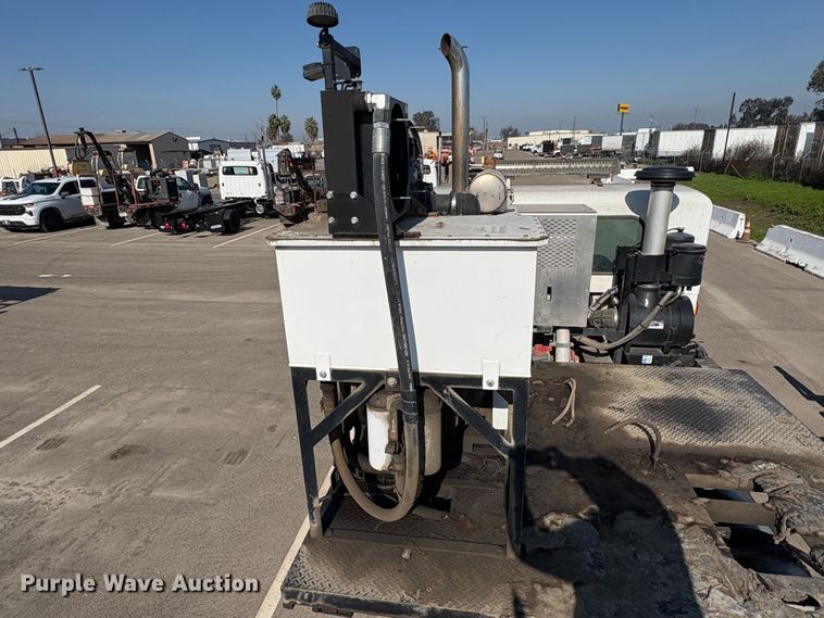 image for item EC8214 2013 Peterbilt 320 flatbed truck