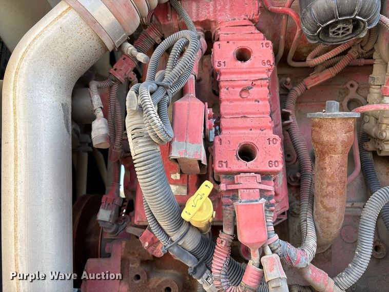 image for item EC8214 2013 Peterbilt 320 flatbed truck