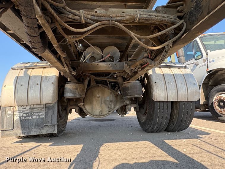 image for item EC8214 2013 Peterbilt 320 flatbed truck