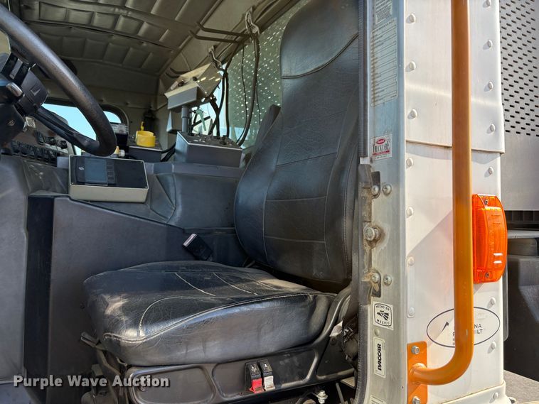 image for item EC8214 2013 Peterbilt 320 flatbed truck