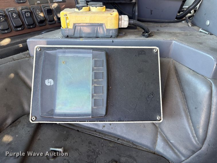 image for item EC8214 2013 Peterbilt 320 flatbed truck