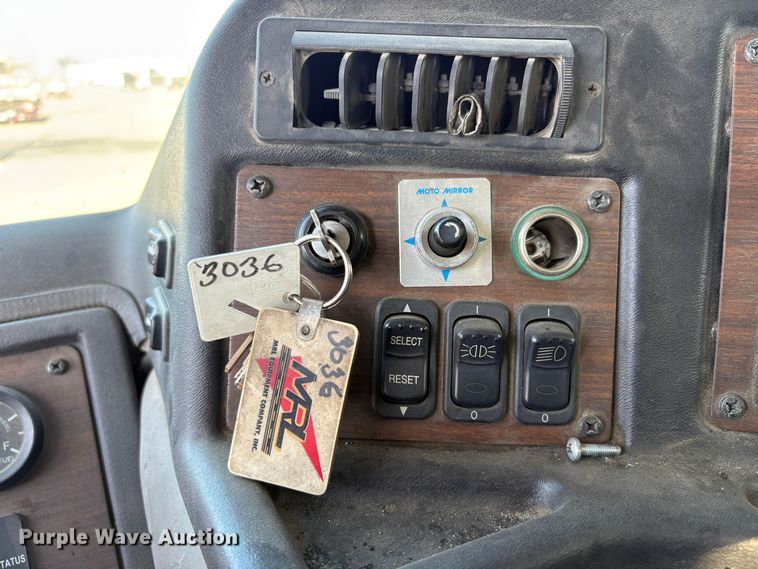 image for item EC8214 2013 Peterbilt 320 flatbed truck