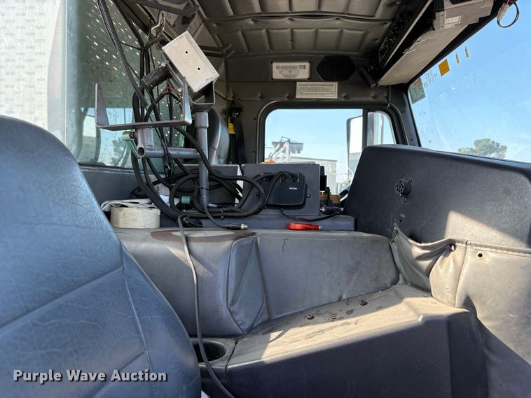 image for item EC8214 2013 Peterbilt 320 flatbed truck