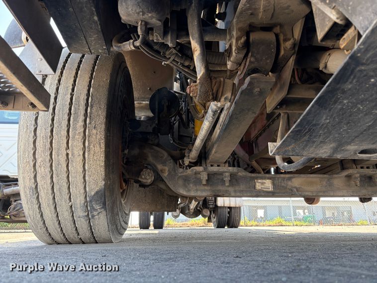 image for item EC8214 2013 Peterbilt 320 flatbed truck