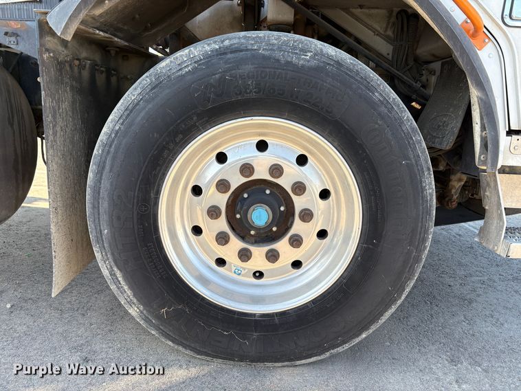 image for item EC8214 2013 Peterbilt 320 flatbed truck