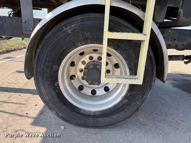 image for item EC8214 2013 Peterbilt 320 flatbed truck