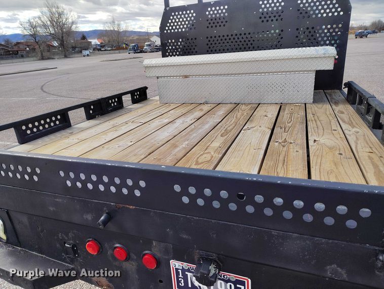 image for item DT0919 2012 Ford F350 Super Duty  Crew Cab flatbed pickup truck