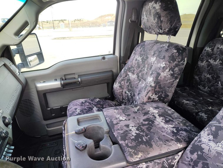 image for item DT0919 2012 Ford F350 Super Duty  Crew Cab flatbed pickup truck