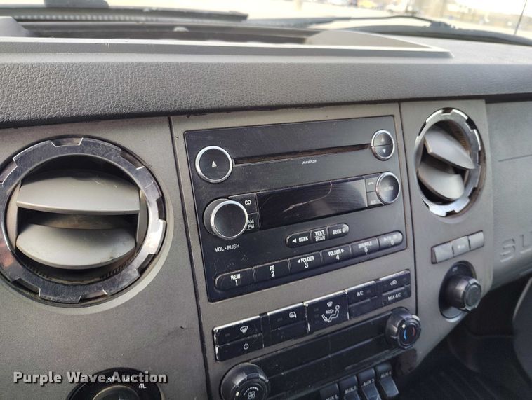 image for item DT0919 2012 Ford F350 Super Duty  Crew Cab flatbed pickup truck