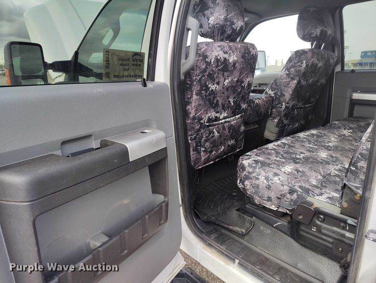 image for item DT0919 2012 Ford F350 Super Duty  Crew Cab flatbed pickup truck