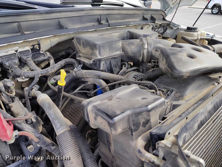 image for item DT0919 2012 Ford F350 Super Duty  Crew Cab flatbed pickup truck