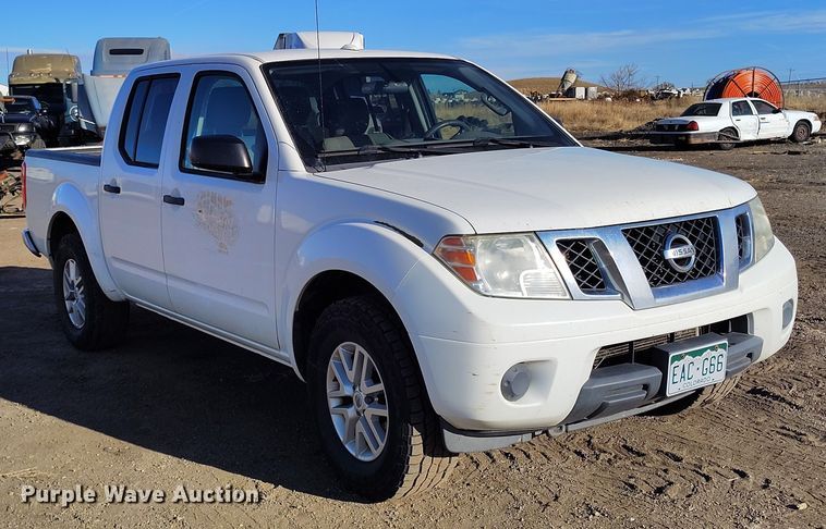 image for item DT0948 2016 Nissan Frontier Crew Cab pickup truck