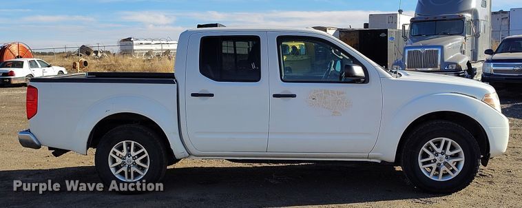 image for item DT0948 2016 Nissan Frontier Crew Cab pickup truck