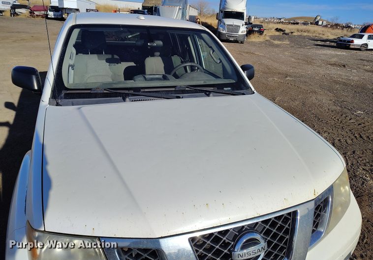 image for item DT0948 2016 Nissan Frontier Crew Cab pickup truck