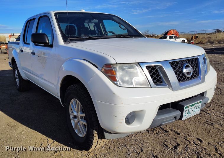 image for item DT0948 2016 Nissan Frontier Crew Cab pickup truck