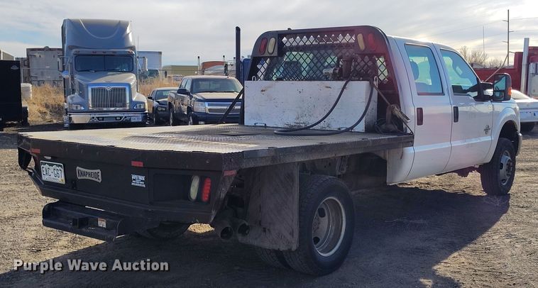 image for item DT0949 2016 Ford F350 Super Duty  Crew Cab flatbed pickup truck