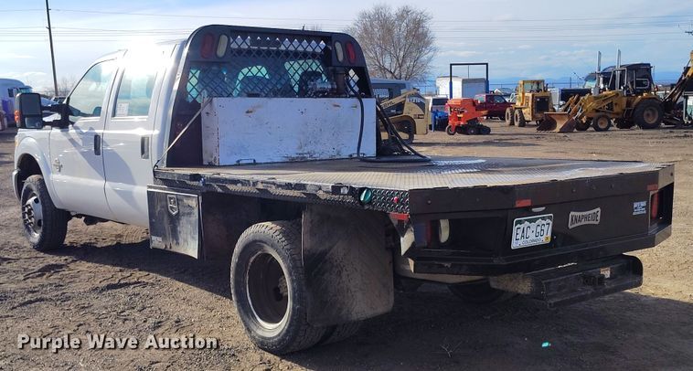 image for item DT0949 2016 Ford F350 Super Duty  Crew Cab flatbed pickup truck